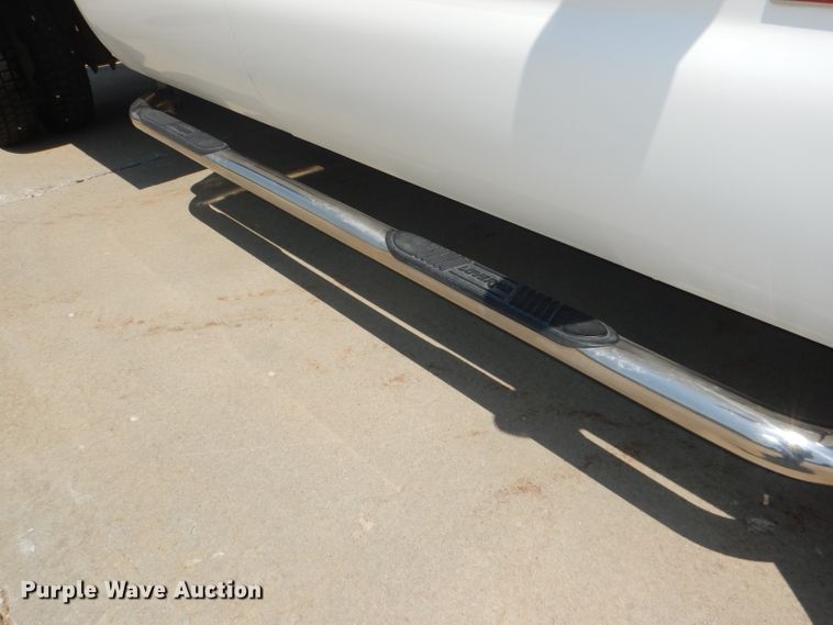 image for item DG4822 2005 Ford F550 Super Duty Crew Cab flatbed truck