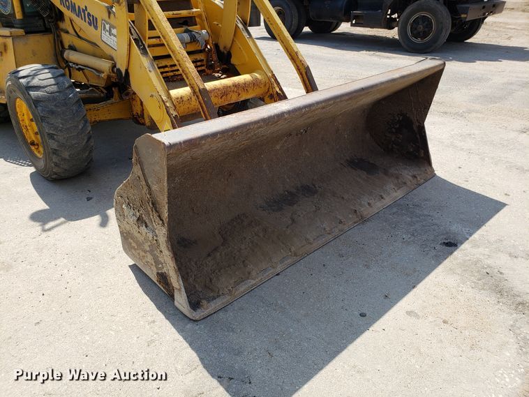 image for item FL9046 Komatsu WB140 backhoe