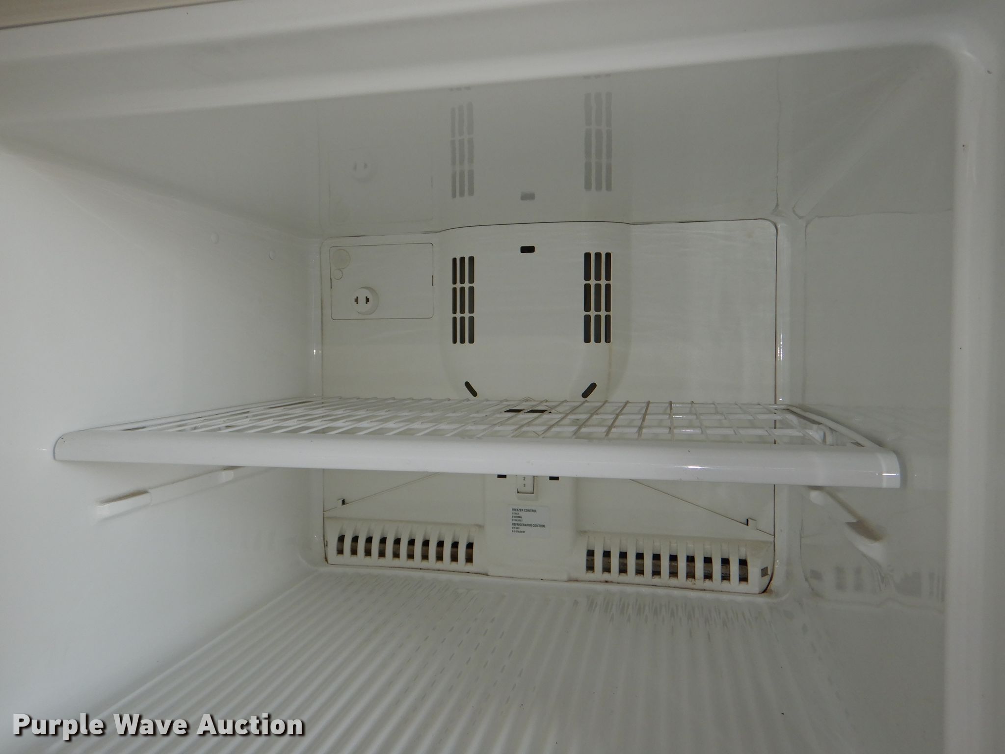 GE refrigerator in Topeka, KS Item FP9132 sold Purple Wave