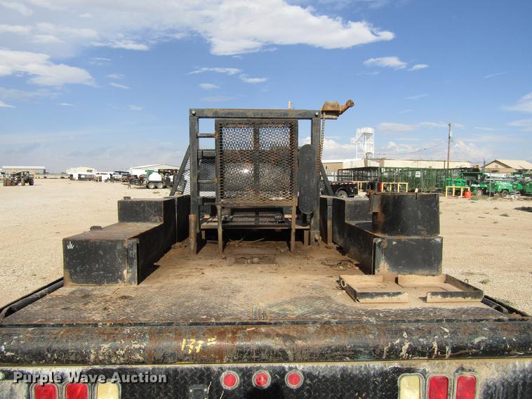 image for item DD4409 2014 Dodge Ram 5500 Crew Cab flatbed truck