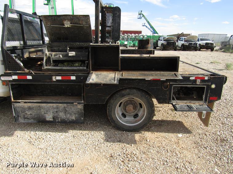 image for item DD4409 2014 Dodge Ram 5500 Crew Cab flatbed truck