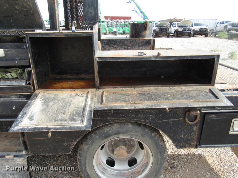 image for item DD4409 2014 Dodge Ram 5500 Crew Cab flatbed truck