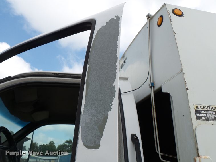 image for item DE7905 2006 GMC C8500 refuse truck