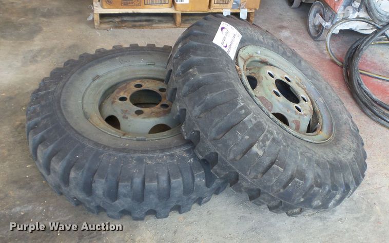 image for item DE7910 (2) 9.00-16 tires and wheels