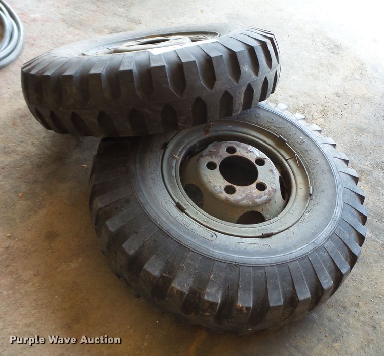 image for item DE7910 (2) 9.00-16 tires and wheels