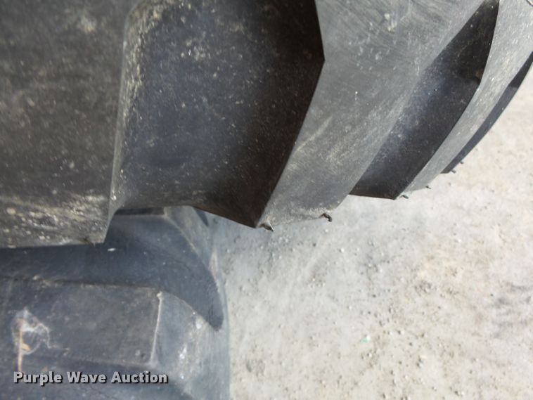 image for item DE7910 (2) 9.00-16 tires and wheels