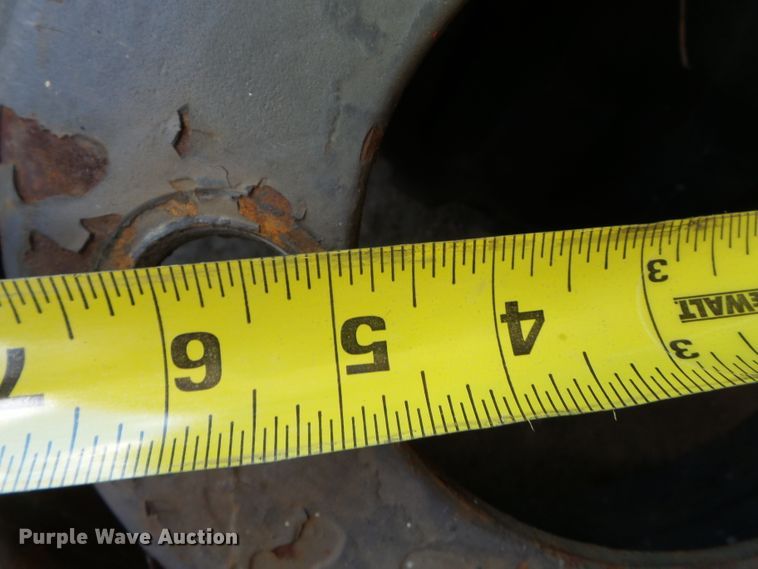 image for item DE7910 (2) 9.00-16 tires and wheels