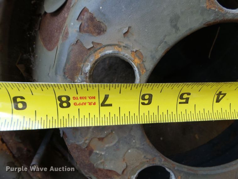 image for item DE7910 (2) 9.00-16 tires and wheels