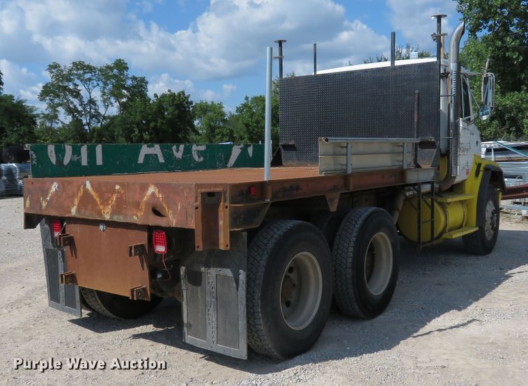 image for item DE8215 1998 Freightliner FL112 flatbed truck