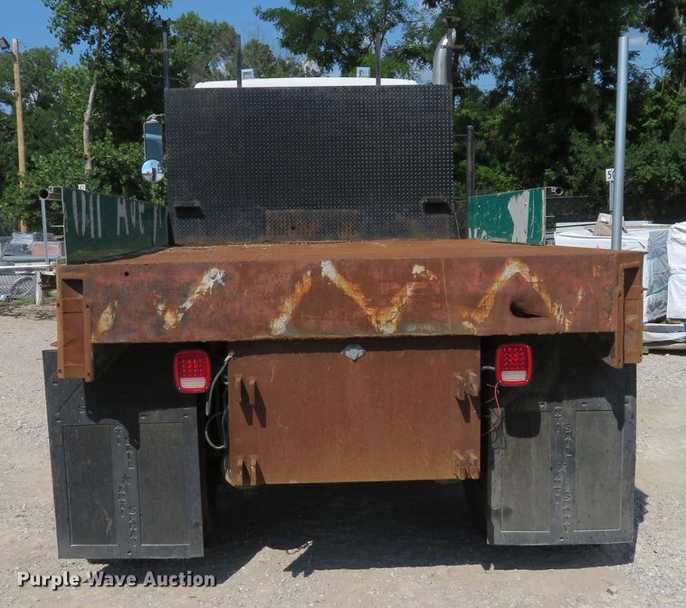 image for item DE8215 1998 Freightliner FL112 flatbed truck