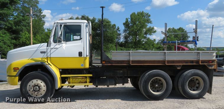 image for item DE8215 1998 Freightliner FL112 flatbed truck