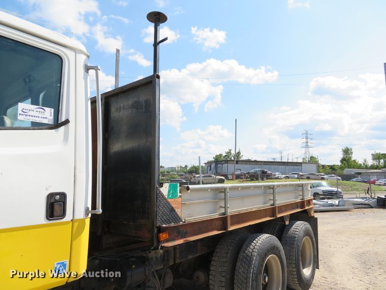 image for item DE8215 1998 Freightliner FL112 flatbed truck
