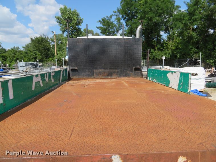 image for item DE8215 1998 Freightliner FL112 flatbed truck