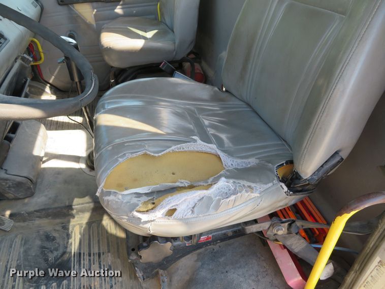 image for item DE8215 1998 Freightliner FL112 flatbed truck