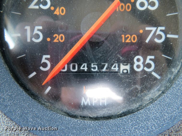 image for item DE8215 1998 Freightliner FL112 flatbed truck