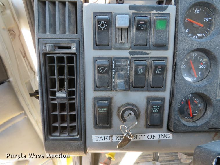 image for item DE8215 1998 Freightliner FL112 flatbed truck