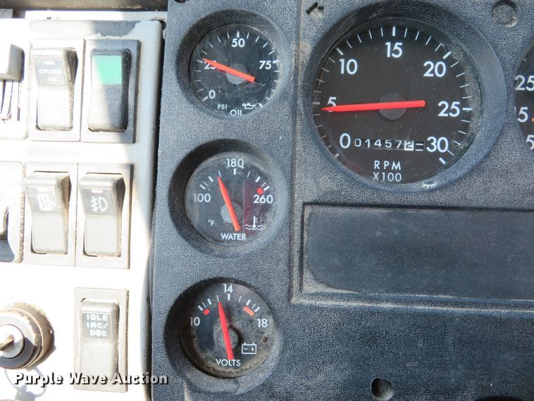 image for item DE8215 1998 Freightliner FL112 flatbed truck