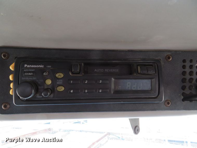 image for item DE8215 1998 Freightliner FL112 flatbed truck