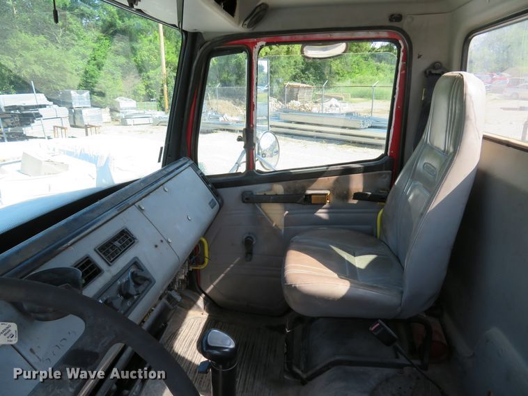 image for item DE8215 1998 Freightliner FL112 flatbed truck