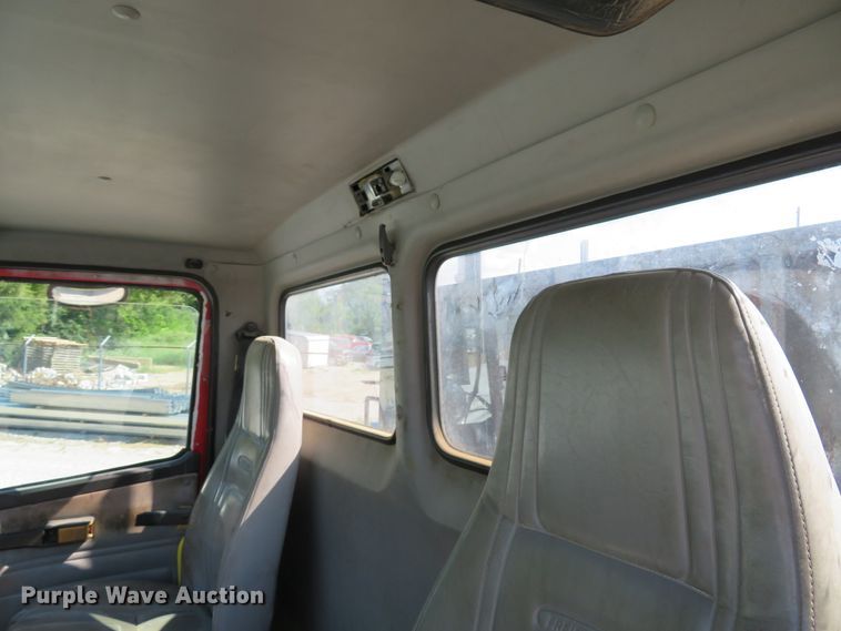 image for item DE8215 1998 Freightliner FL112 flatbed truck