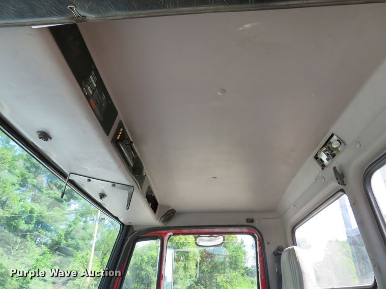 image for item DE8215 1998 Freightliner FL112 flatbed truck