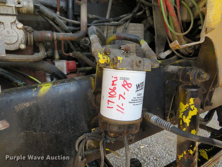 image for item DE8215 1998 Freightliner FL112 flatbed truck