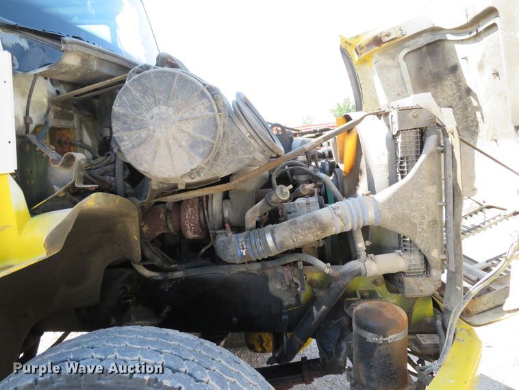 image for item DE8215 1998 Freightliner FL112 flatbed truck