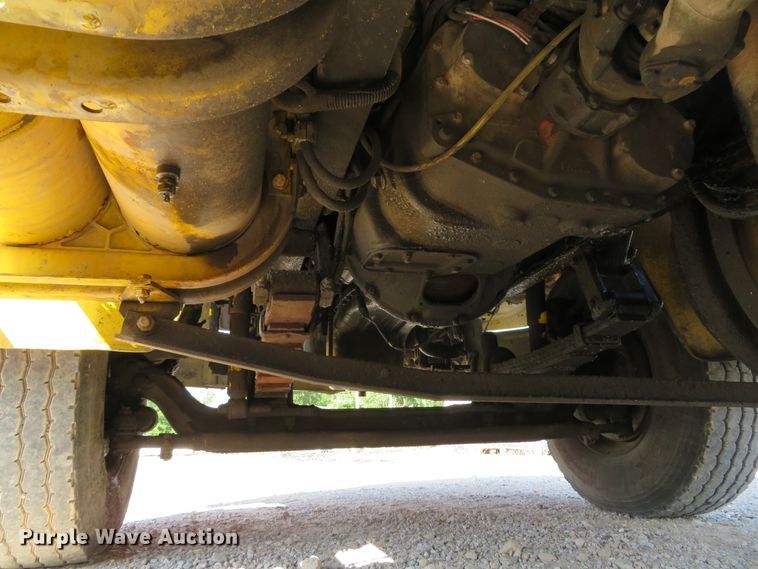 image for item DE8215 1998 Freightliner FL112 flatbed truck