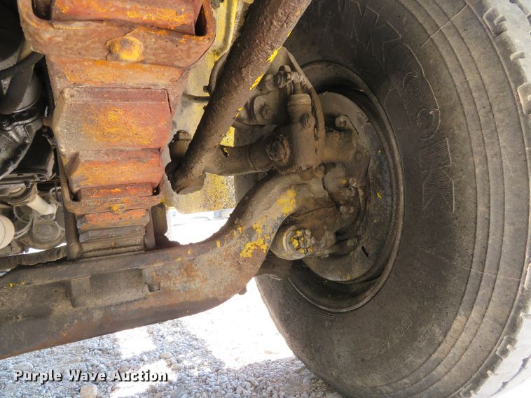 image for item DE8215 1998 Freightliner FL112 flatbed truck