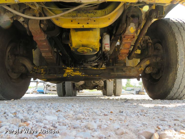 image for item DE8215 1998 Freightliner FL112 flatbed truck