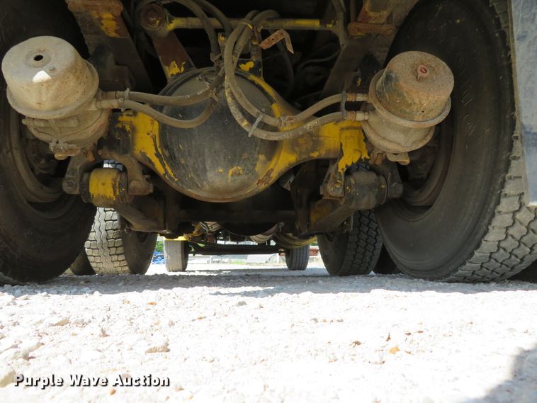 image for item DE8215 1998 Freightliner FL112 flatbed truck