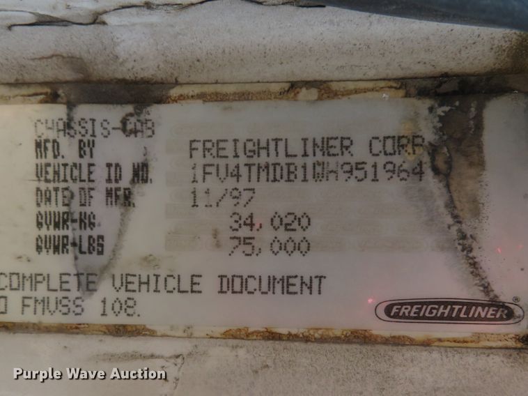 image for item DE8215 1998 Freightliner FL112 flatbed truck