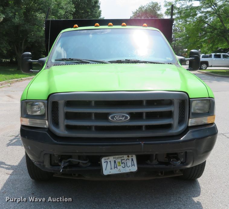 image for item DE8234 2004 Ford F350 Super Duty XL flatbed pickup truck