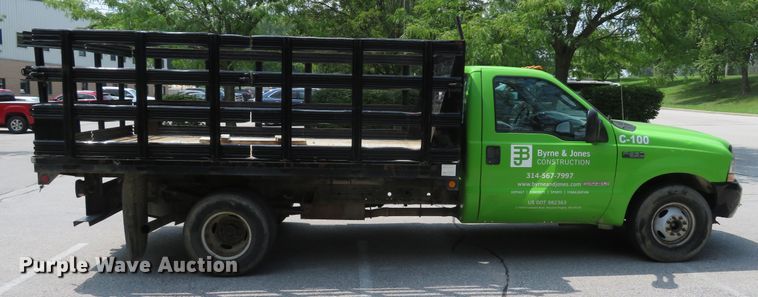 image for item DE8234 2004 Ford F350 Super Duty XL flatbed pickup truck