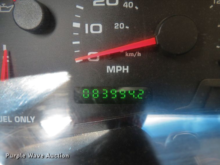 image for item DE8234 2004 Ford F350 Super Duty XL flatbed pickup truck