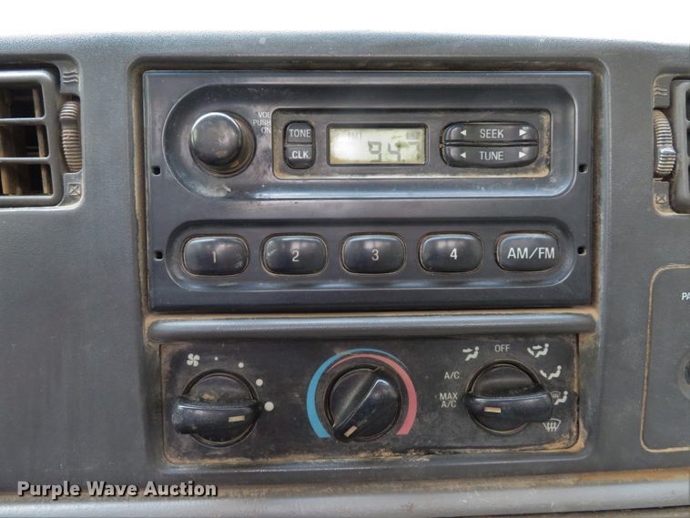 image for item DE8234 2004 Ford F350 Super Duty XL flatbed pickup truck