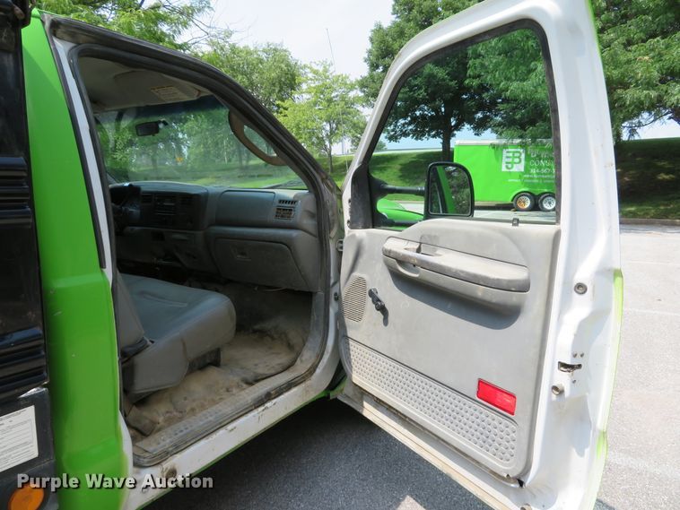 image for item DE8234 2004 Ford F350 Super Duty XL flatbed pickup truck