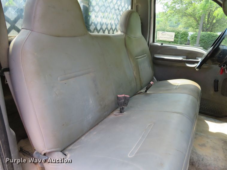 image for item DE8234 2004 Ford F350 Super Duty XL flatbed pickup truck