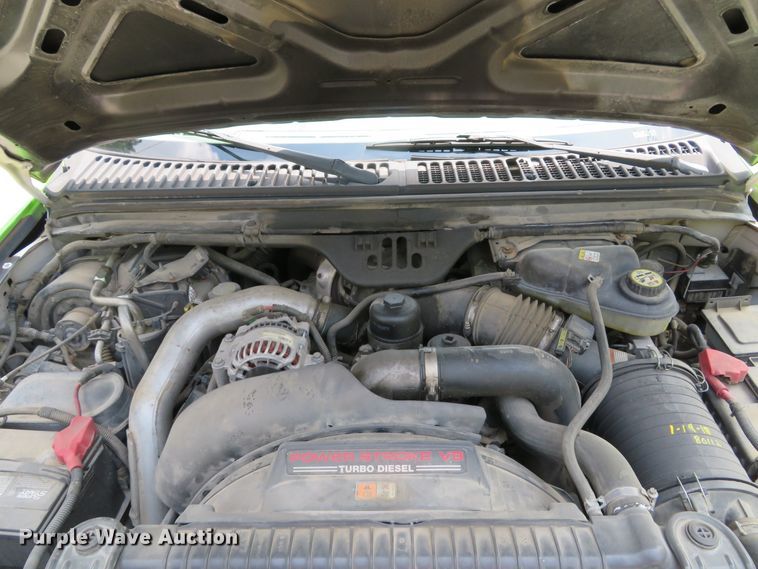 image for item DE8234 2004 Ford F350 Super Duty XL flatbed pickup truck