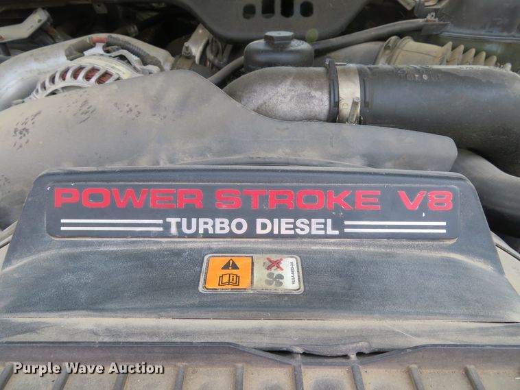 image for item DE8234 2004 Ford F350 Super Duty XL flatbed pickup truck