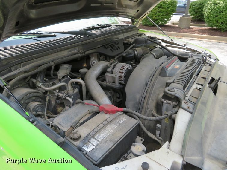 image for item DE8234 2004 Ford F350 Super Duty XL flatbed pickup truck