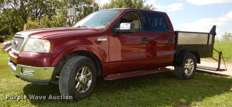 image for item DG4824 2004 Ford F150 Lariat SuperCrew flatbed pickup truck