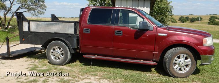 image for item DG4824 2004 Ford F150 Lariat SuperCrew flatbed pickup truck