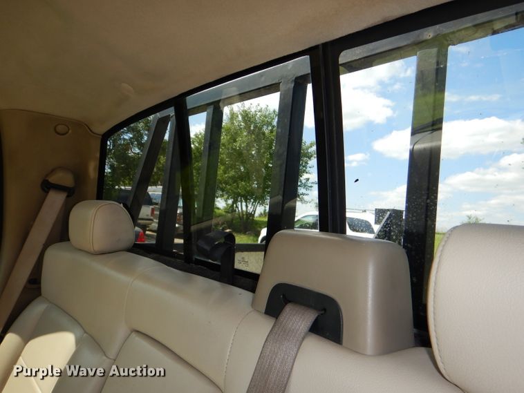 image for item DG4824 2004 Ford F150 Lariat SuperCrew flatbed pickup truck