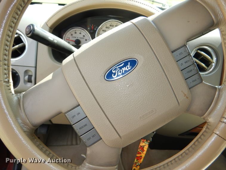 image for item DG4824 2004 Ford F150 Lariat SuperCrew flatbed pickup truck