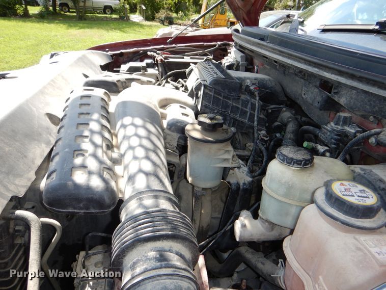 image for item DG4824 2004 Ford F150 Lariat SuperCrew flatbed pickup truck