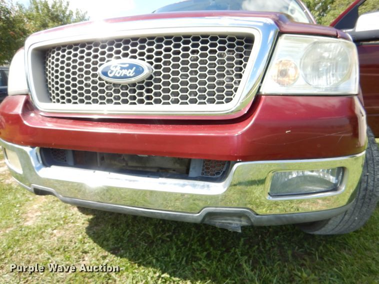 image for item DG4824 2004 Ford F150 Lariat SuperCrew flatbed pickup truck