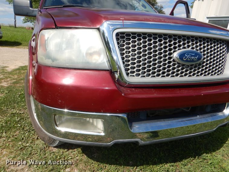 image for item DG4824 2004 Ford F150 Lariat SuperCrew flatbed pickup truck