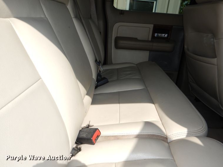 image for item DG4824 2004 Ford F150 Lariat SuperCrew flatbed pickup truck