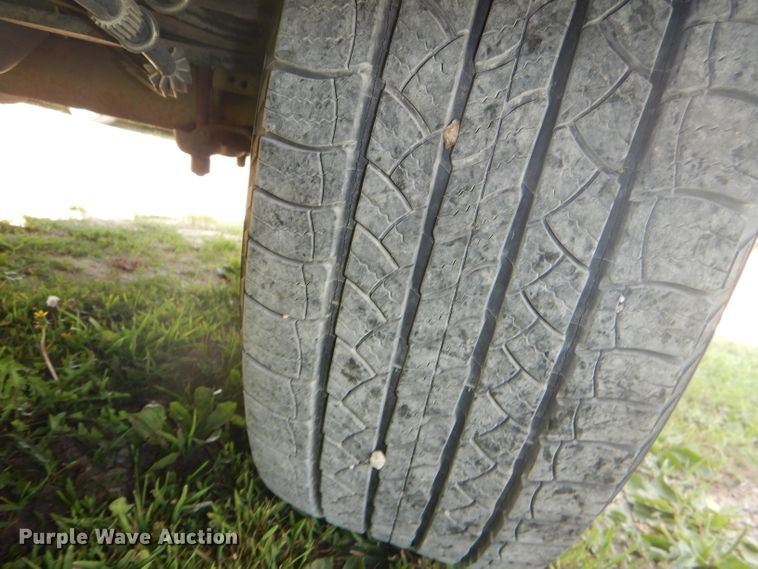 image for item DG4824 2004 Ford F150 Lariat SuperCrew flatbed pickup truck